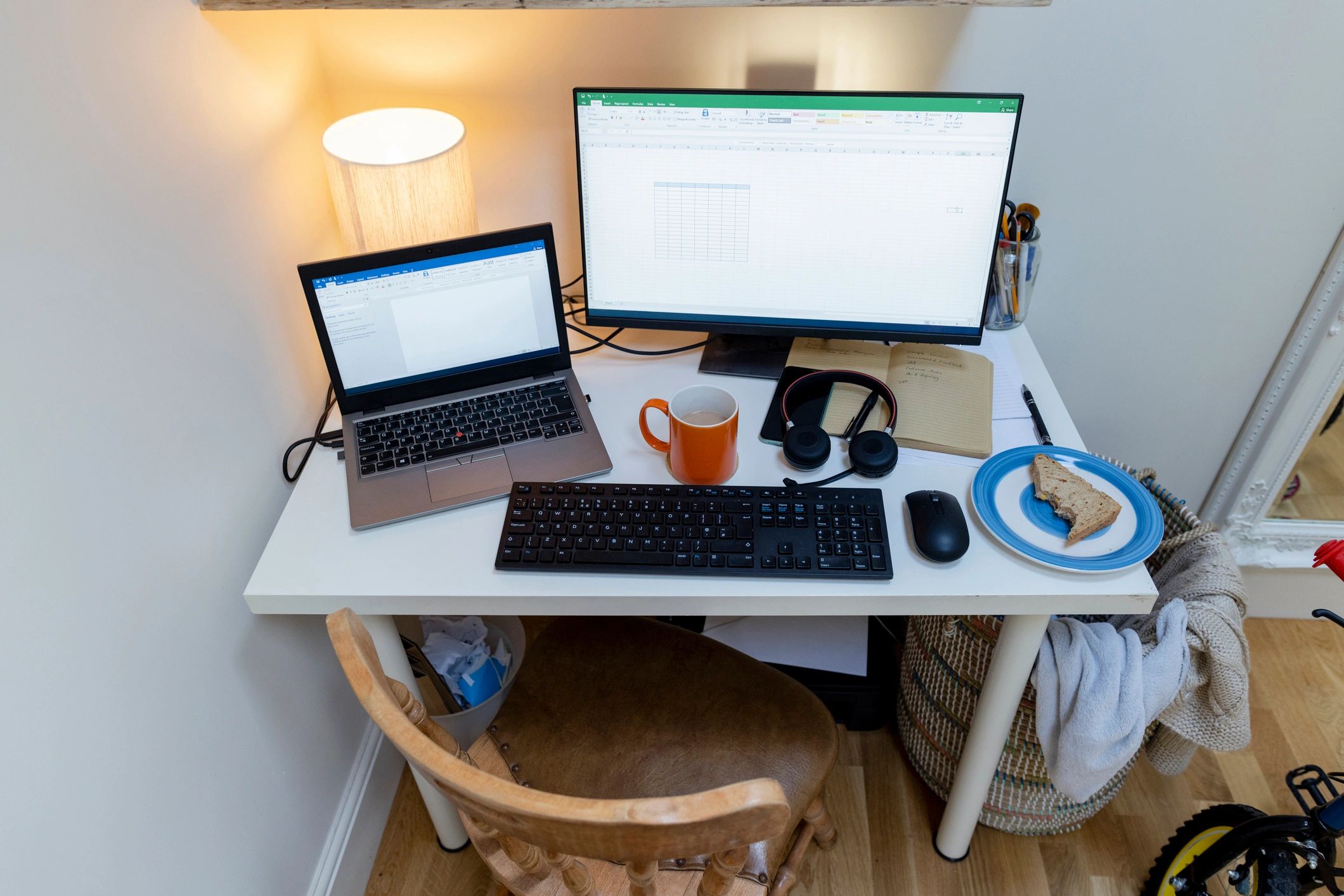 Desk workspace with computer monitors representing website analytics and administration