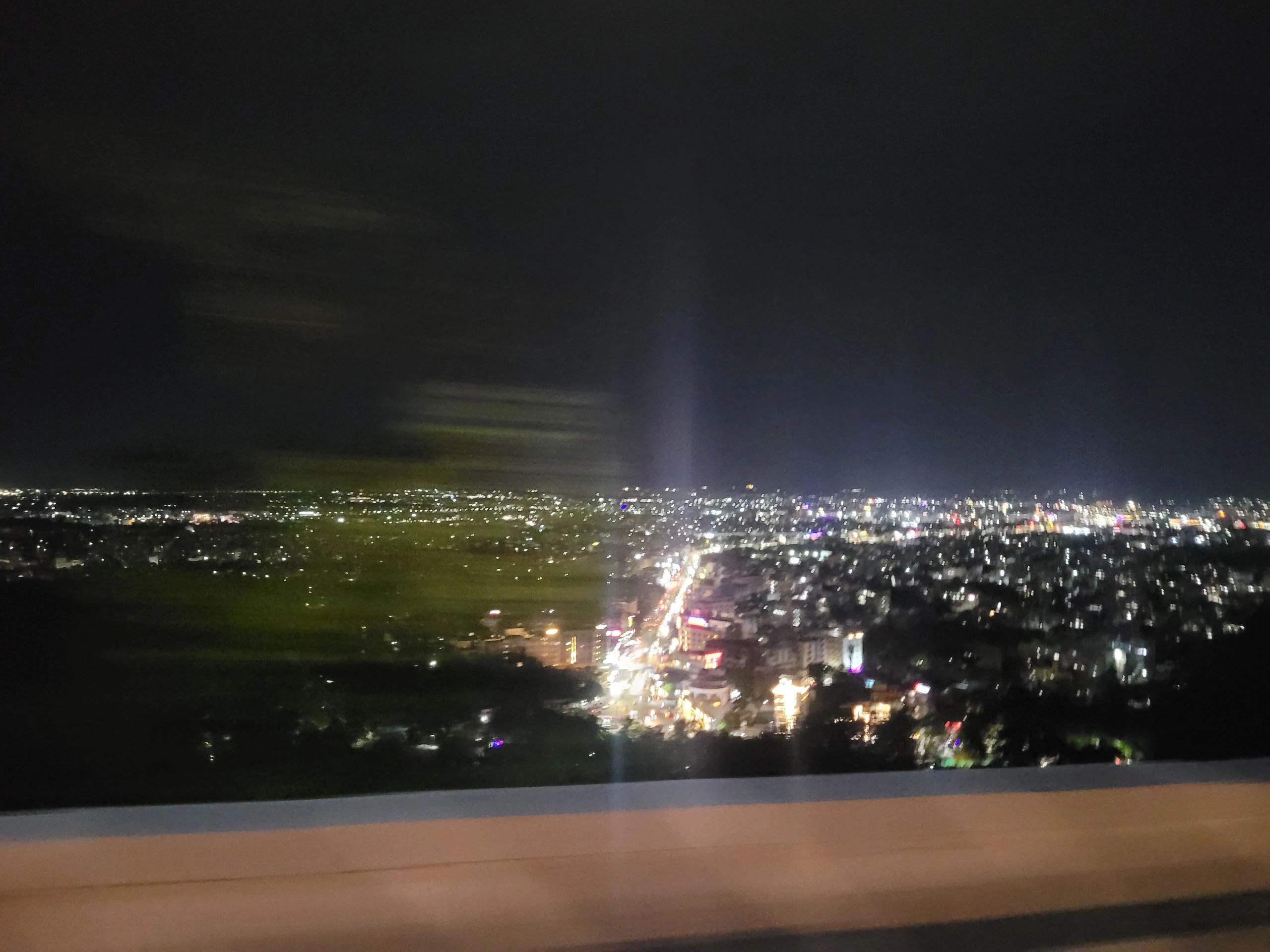 Night city lights overlooking an urban skyline