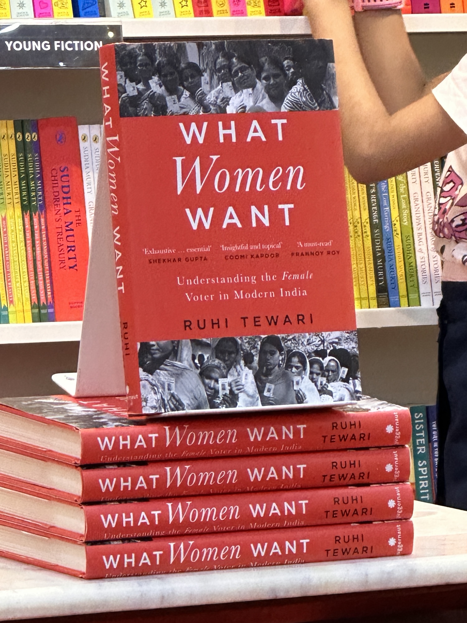 A stack of Ruhi Tewari's book What Women Want on display at Crossword Pune book launch event.